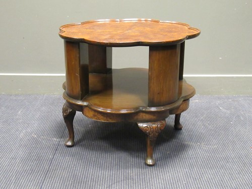 Lot 407 - An early 20th century walnut revolving book or...