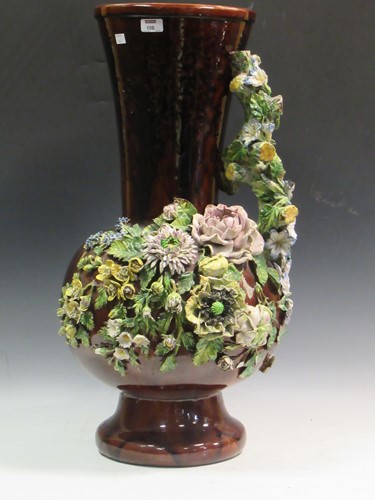 Lot 106 - A large floor standing glazed earthenware vase...