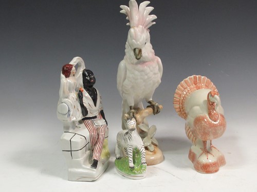 Lot 77 - A Royal Dux model of a cockatoo, a Rye pottery...