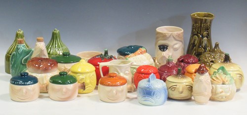Lot 105 - A large collection of Sylvac face pots,...
