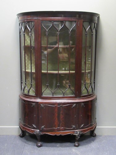 Lot 392 - An Edwardian mahogany bow front cabinet on...