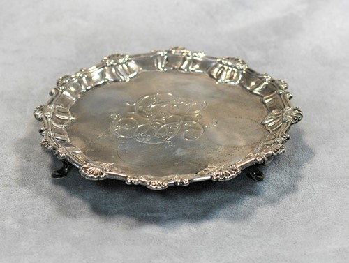 Lot 378 - A George III 18th century silver waiter