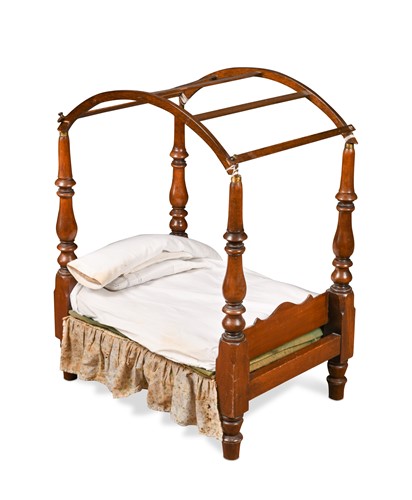 Lot 843 - A Victorian mahogany small scale four poster bedstead