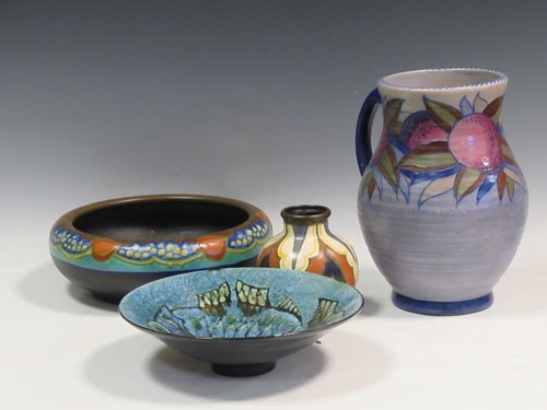Lot 76 - A Charlotte Rhead jug, a Gouda vase, a Gouda...