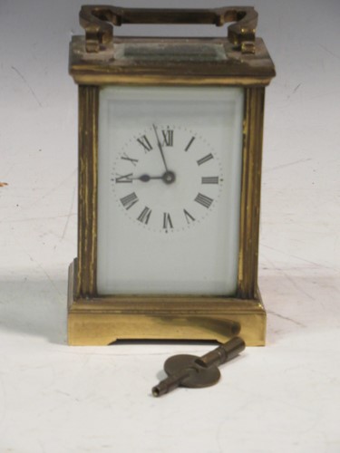 Lot 55 - A gilt brass carriage timepiece 13cm high