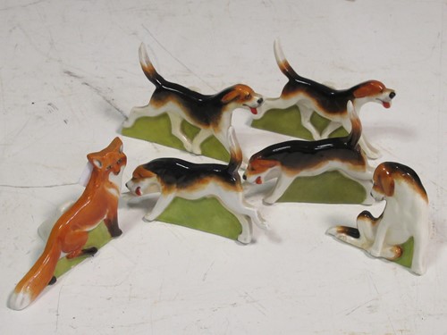 Lot 50 - A set of Royal Worcester menu holders of a fox...