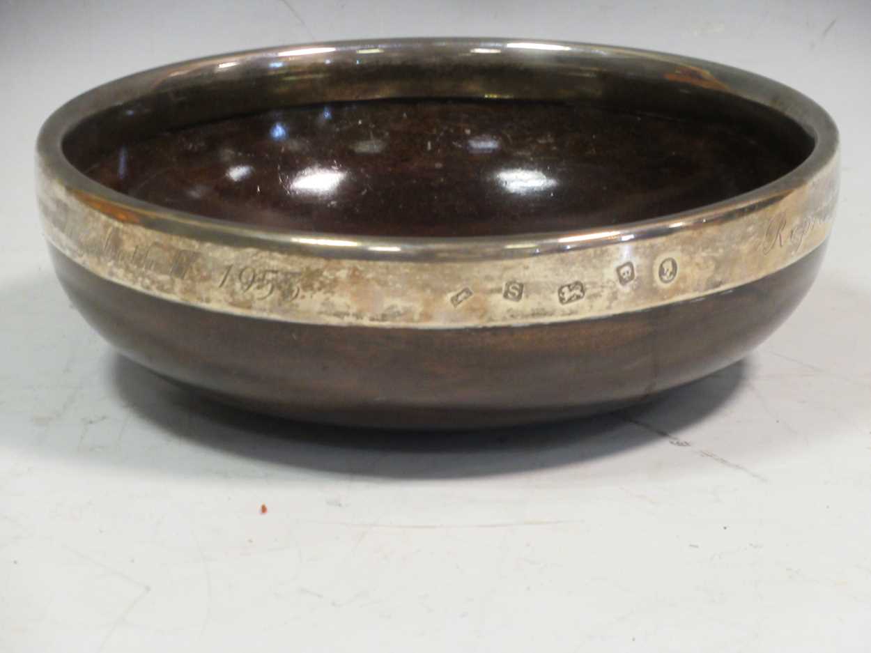 Lot 231 - A silver mounted mazer, the rim inscibed...