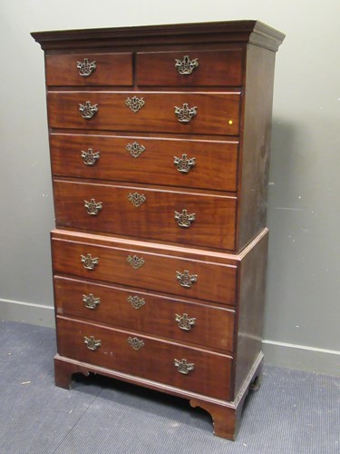 Lot 469 - A George III oak and mahogany chest on chest,...