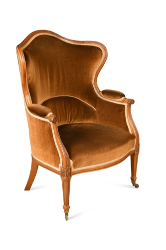 Lot 961 - An Edwardian mahogany wing armchair