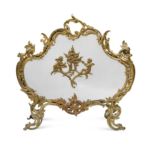 Lot 802 - A brass rococo fire screen, late 19th century