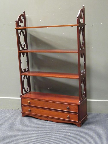 Lot 520 - A George III style set of hanging wall shelves,...