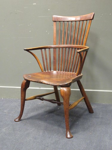 Lot 529 - An early 19th century elm and fruitwood...