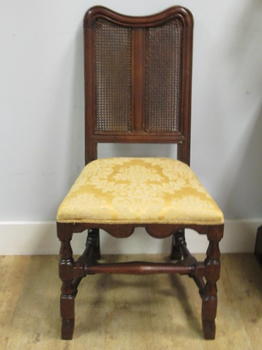 Lot 527 - A 17th century oak and cane chair with a...