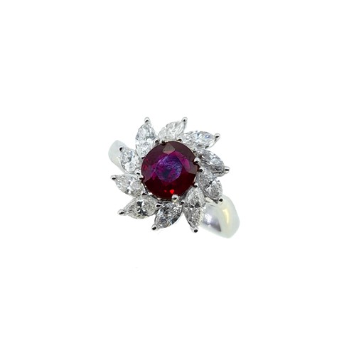 Lot 191 - A ruby and diamond 'Catherine Wheel' style cluster ring