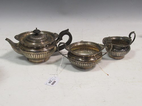 Lot 236 - An Edwardian silver three-piece bachelor's tea...