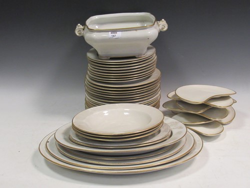 Lot 147 - A Royal Worcester white glazed dinner service...