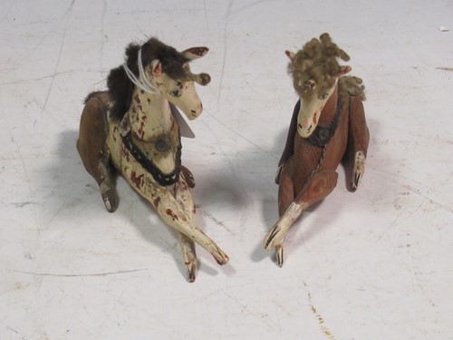 Lot 159 - Sam Smith of Darmouth, two carved unicorns (2)