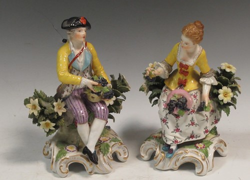 Lot 287 - A pair of Dresden bocage figurines, on gilt...