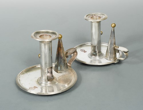 Lot 332 - A pair of early 19th century Old Sheffield Plate chambersticks, mark of Matthew Boulton