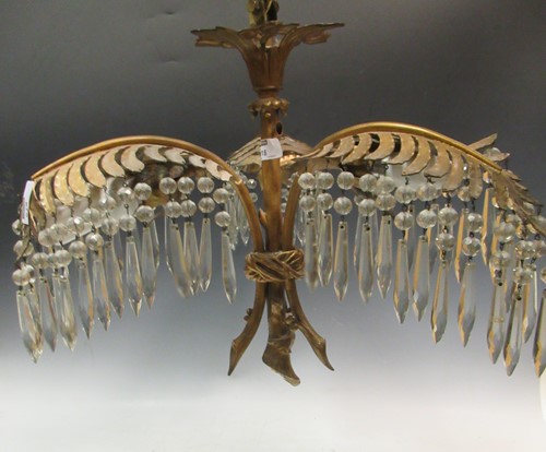 Lot 518 - Gilt metal and cut glass three light...