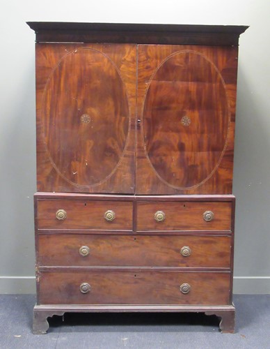 Lot 466 - A George III mahogany linen press, with dental...