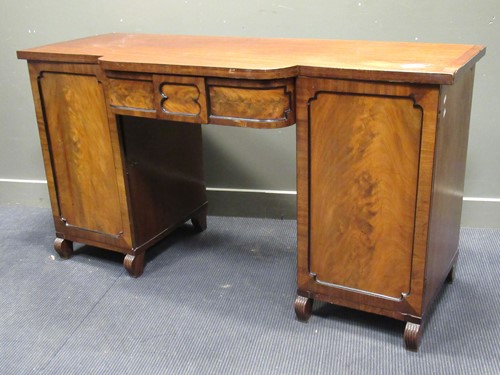 Lot 468 - A 19th century mahogany breakfront sideboard,...