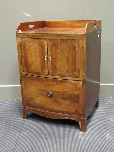 Lot 493 - A 19th century mahogany bow fronted night...