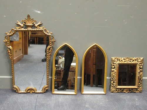 Lot 387 - A pair of gilt wood arched mirrors 55 x 27cm,...