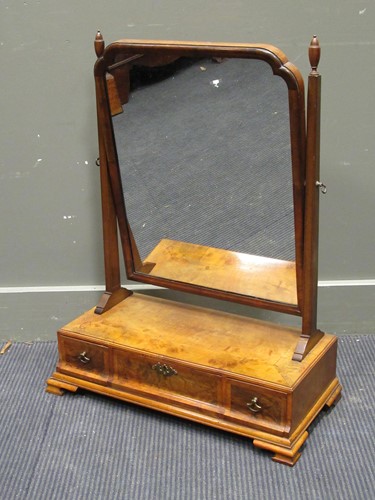 Lot 499 - An 18th century style walnut dressing table...