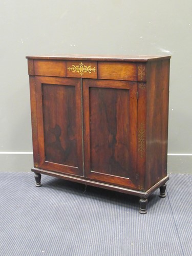 Lot 631 - An early 19th century rosewood side cabinet...