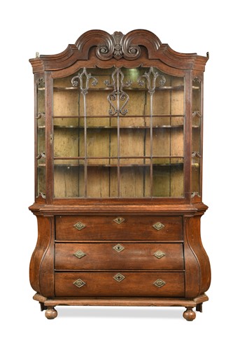 Lot 221 - A Dutch oak bombe cabinet, late 18th /early 19th century