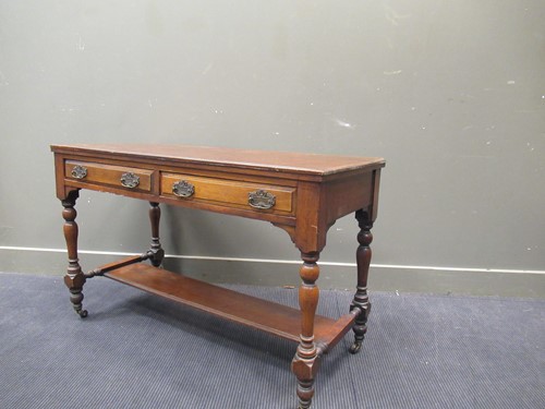 Lot 658 - A late Victorian two-drawer writing table 76 x...