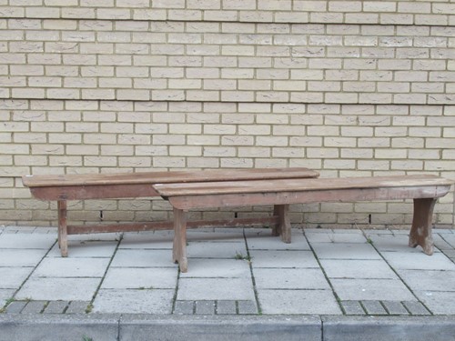Lot 547 - A near pair of pine benches, the plank tops...