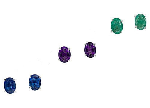 Lot 104 - A set of three gemset ear studs