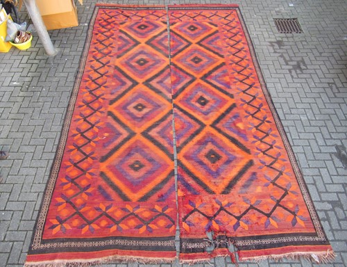 Lot 714A - An large Afghan Kilim of flamestitch design