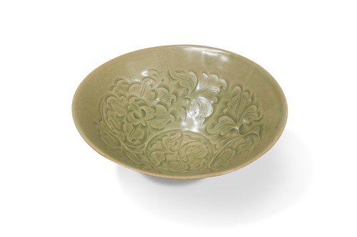 Lot 47 - A Yaozhou celadon moulded bowl, Northern Song Dynasty