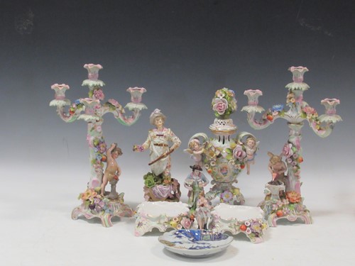 Lot 7 - A pair of Plau und Havel figural candelabra,...
