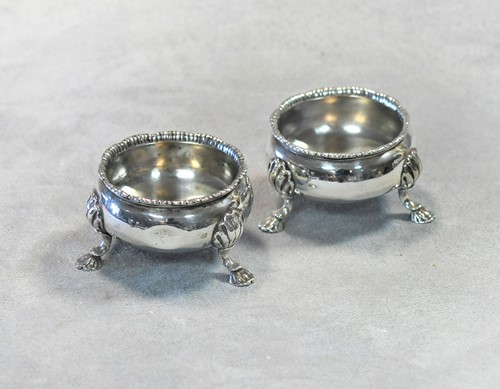 Lot 238 - A pair of George II silver cauldron salts,...