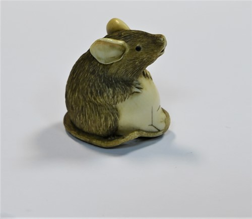 Lot 77 - A Japanese carved ivory rat and chick okimono, late Meiji Period, circa 1900