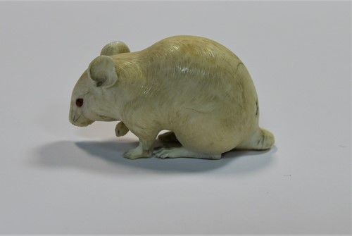 Lot 77 - A Japanese carved ivory rat and chick okimono, late Meiji Period, circa 1900