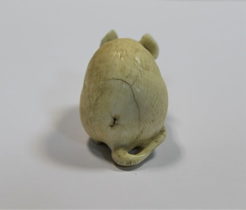 Lot 77 - A Japanese carved ivory rat and chick okimono, late Meiji Period, circa 1900