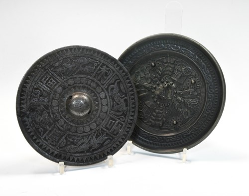 Lot 62 - A Chinese bronze mirror in Han Dynasty Style