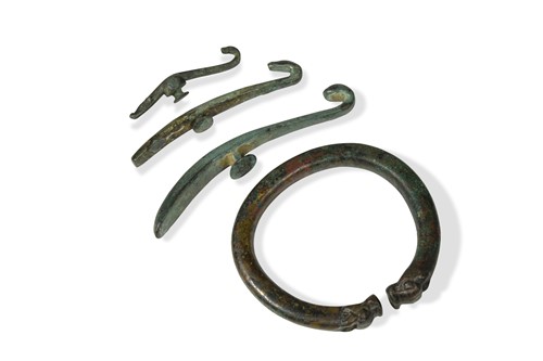 Lot 59 - Three Chinese bronze belt hooks, Han Dynasty