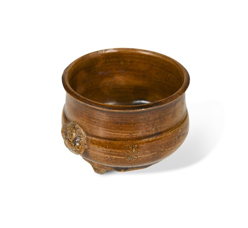 Lot 136 - A Chinese brown glazed small tripod censer, Tang Dynasty 9th Century