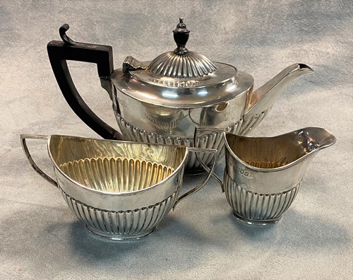 Lot 428 - A Victorian silver bachelor's three-piece tea set