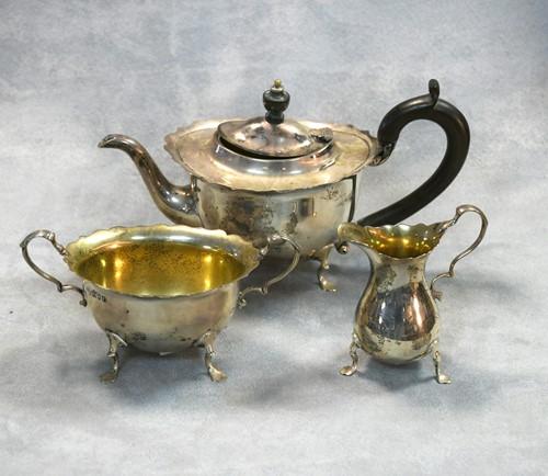 Lot 454 - An early 20th century silver harlequin bachelor's three-piece tea set