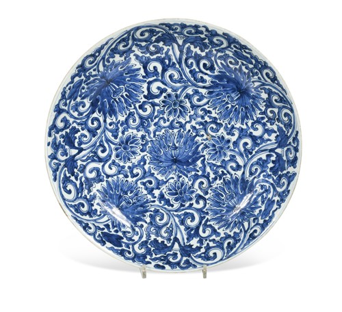 Lot 97 - A Chinese blue and white porcelain lotus dish, Qing Dynasty, Kangxi (1662-1722)