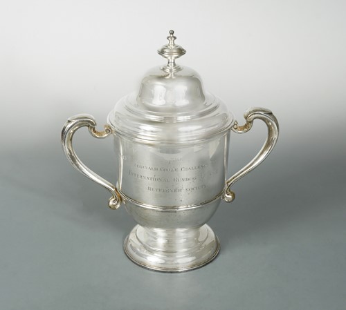 Lot 452 - A George V silver two handled trophy cup and cover