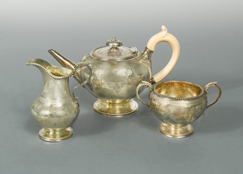 Lot 421 - A Victorian silver gilt three-piece bachelor's tea set