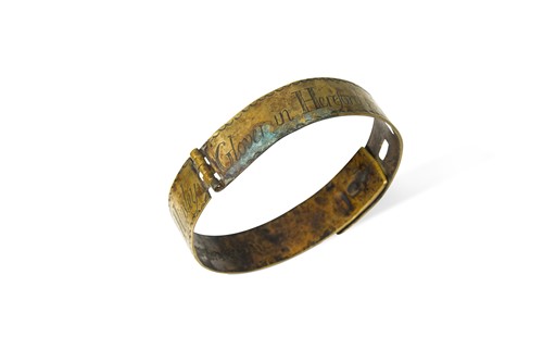 Lot 895 - A brass dog collar dated 1723